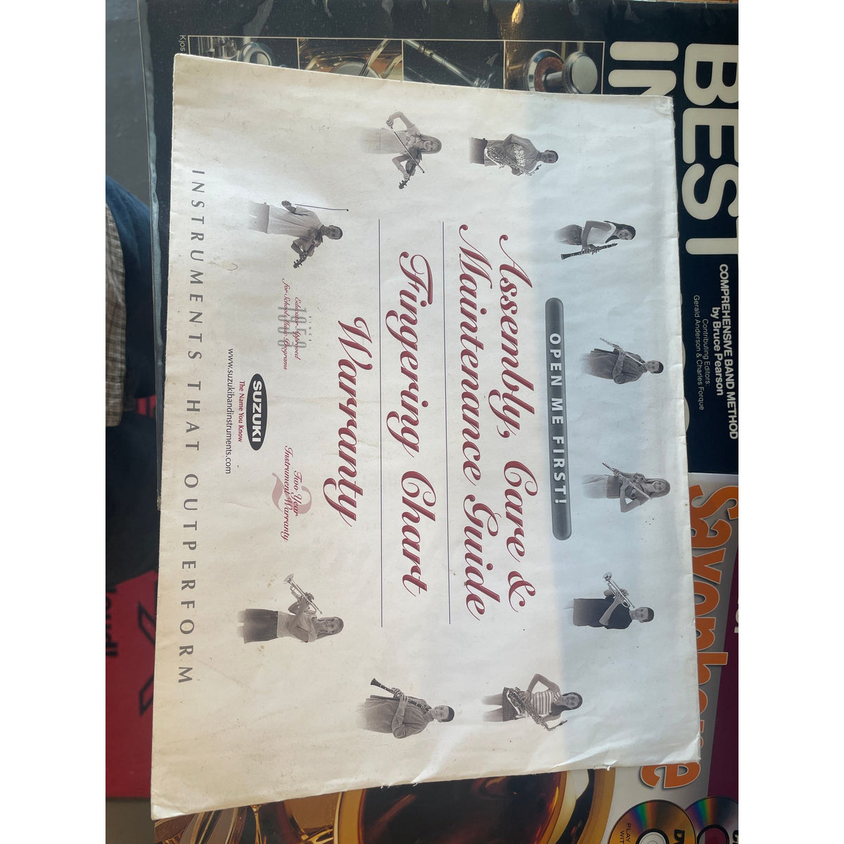 Used Suzuki Alto Saxophone in Case with Books and Stand